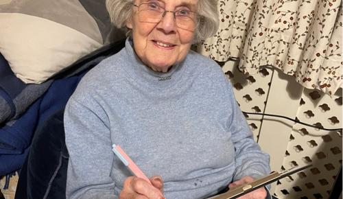 Corton House care home resident completes a survey on transport in Norfolk and Waveney.